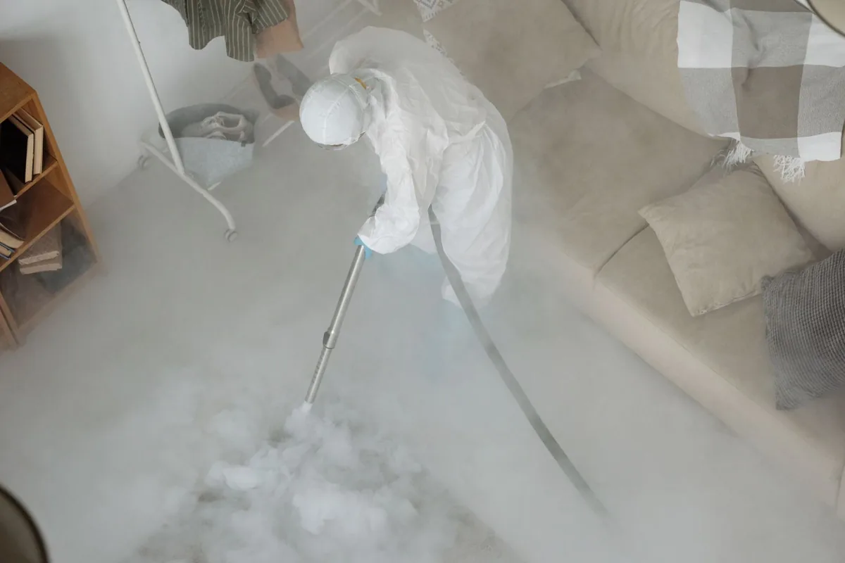 Biohazard cleanup technician in protective equipment, Bay View, Milwaukee, WI